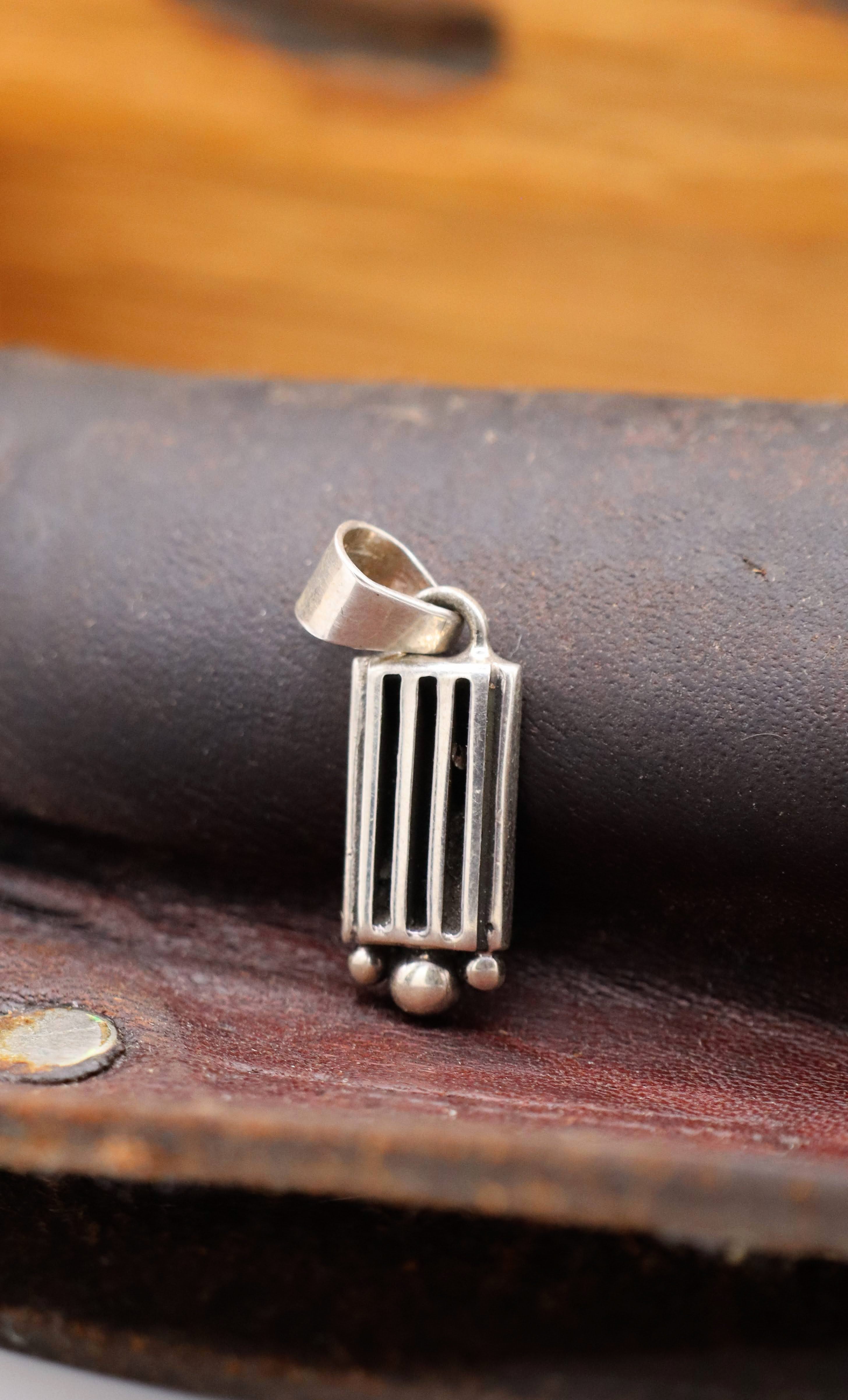 Tiny Tom Pendent